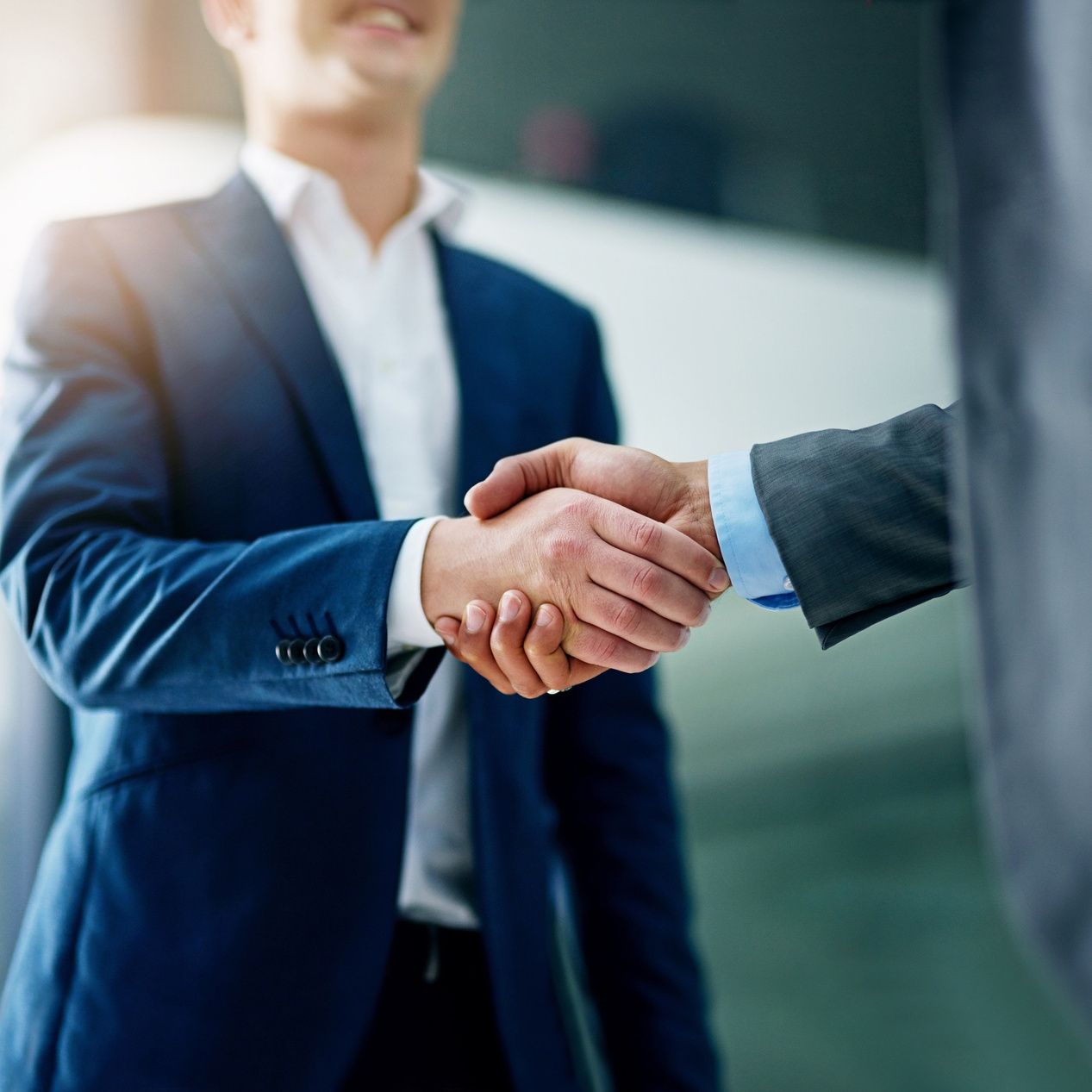 Business partners shaking hands